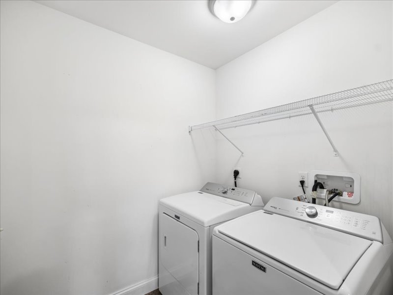 Laundry room with washer and dryer at 134 Salt Creek Drive, Dover, Delaware