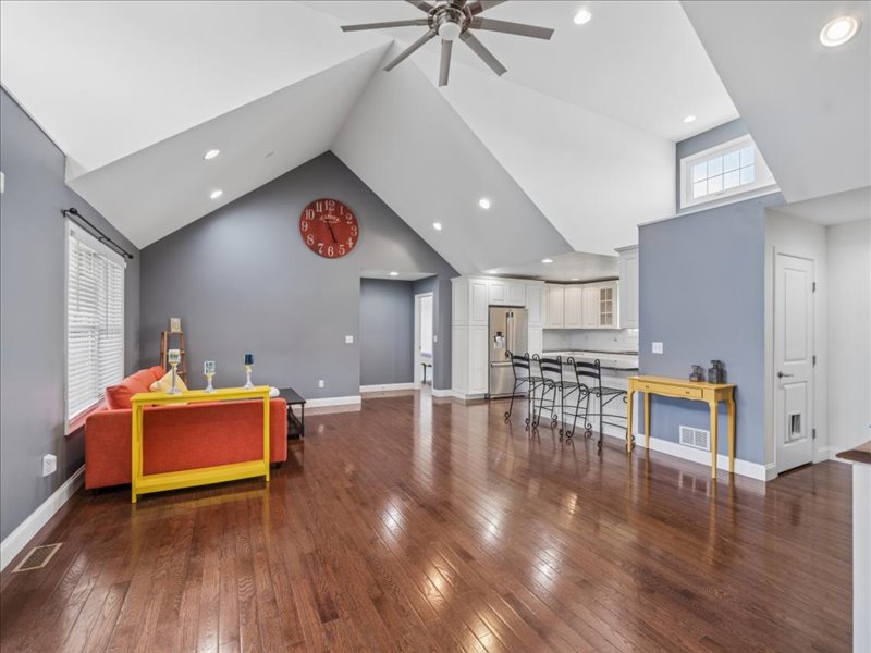 Open living area with vaulted ceilings and hardwood floors at 134 Salt Creek Drive, Dover, Delaware